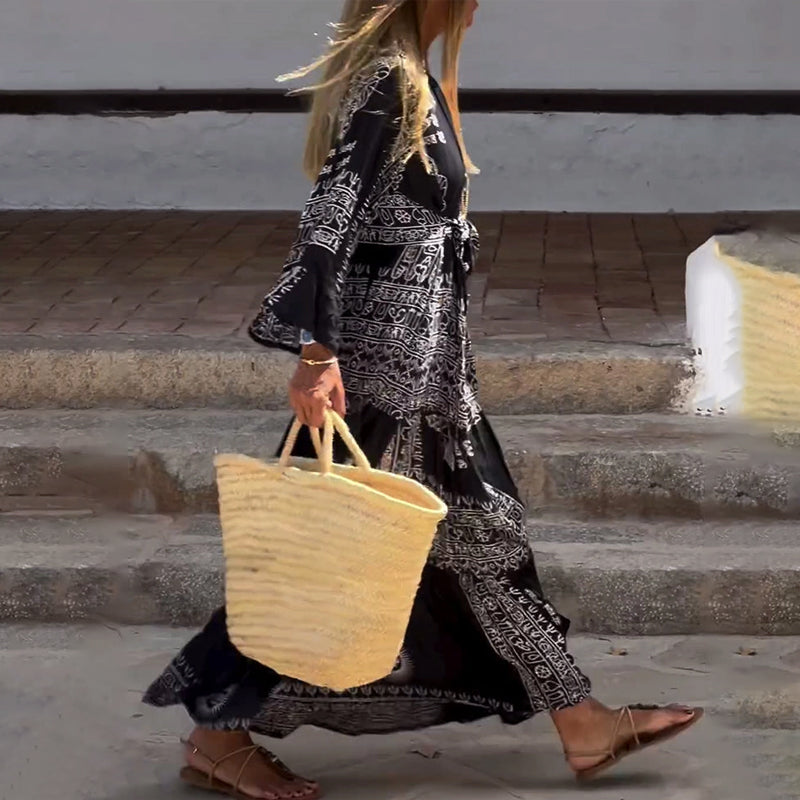 Long skirt with ethnic print and V-neckline