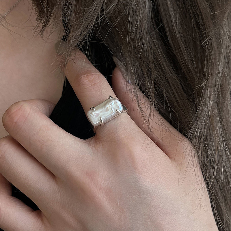CLAW-SET BAROQUE PEARL RING