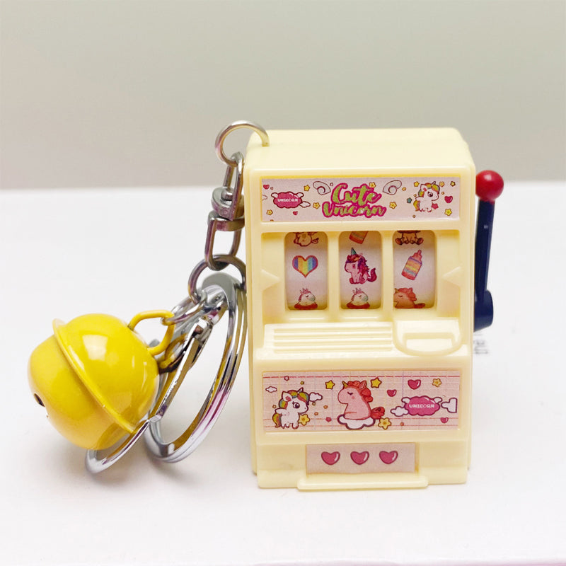 Key ring designed in the form of a slot machine