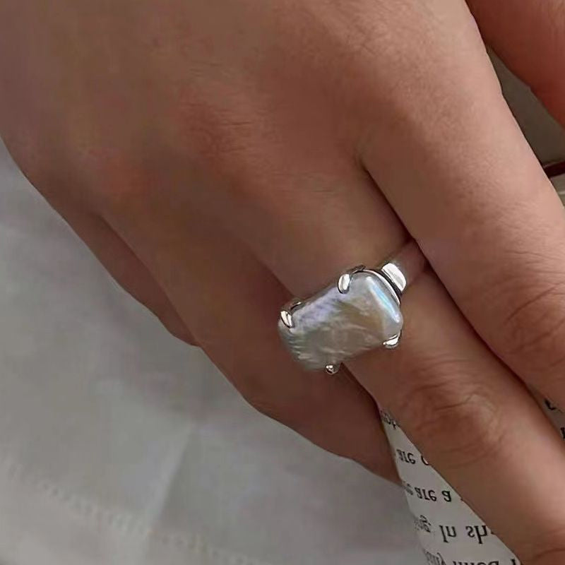CLAW-SET BAROQUE PEARL RING