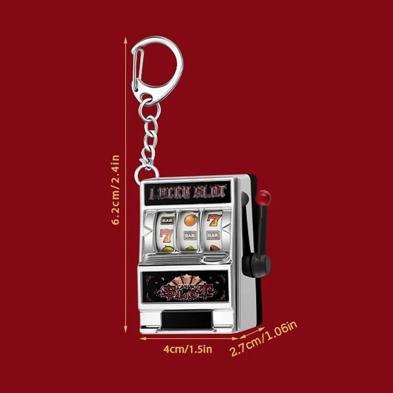 Key ring designed in the form of a slot machine
