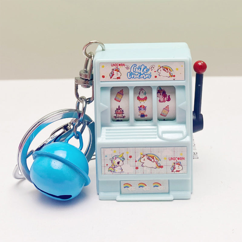 Key ring designed in the form of a slot machine