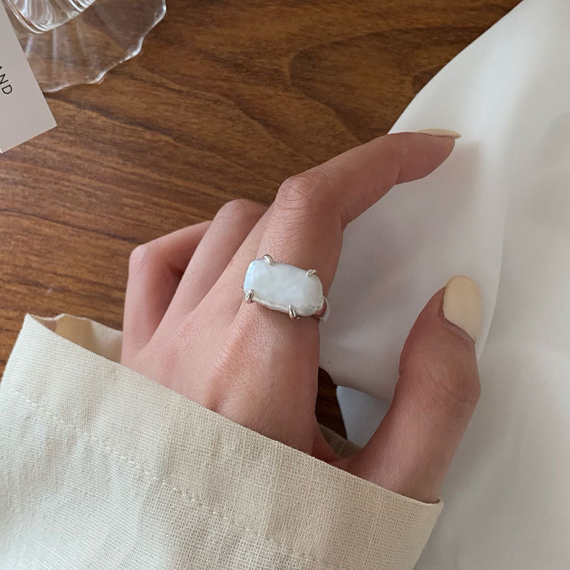CLAW-SET BAROQUE PEARL RING