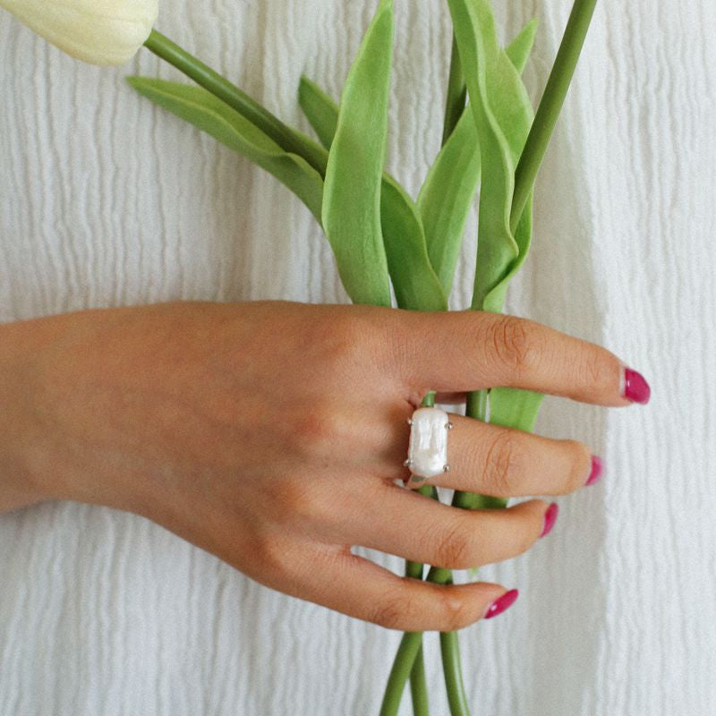CLAW-SET BAROQUE PEARL RING