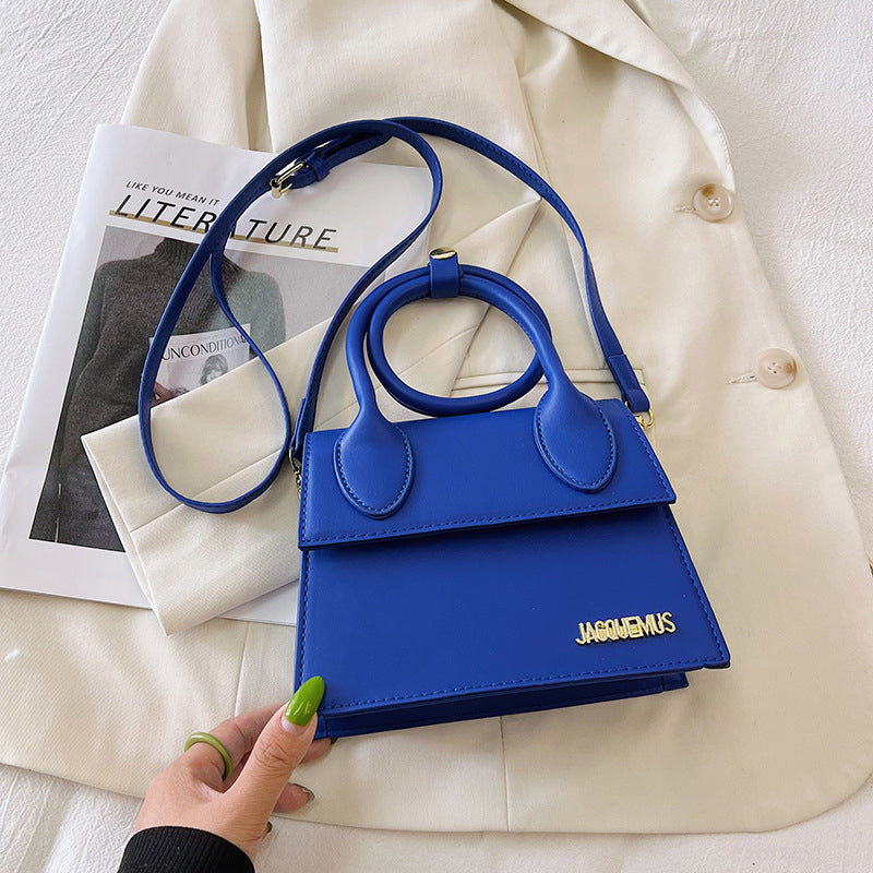 Stylized Flap Handbag