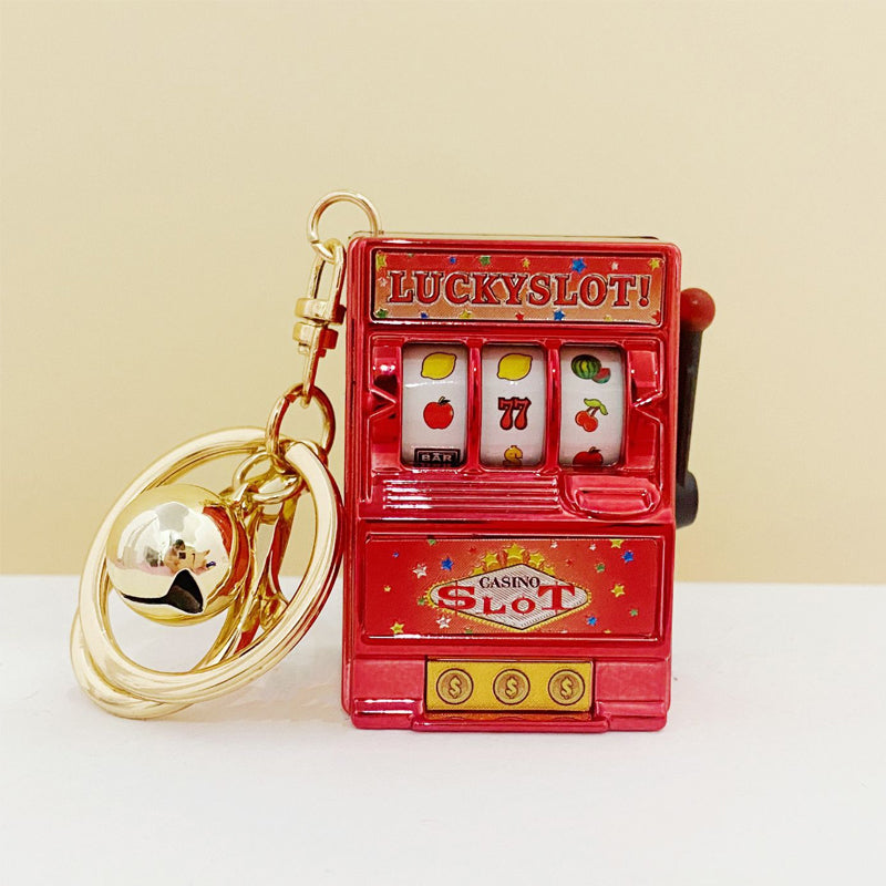 Key ring designed in the form of a slot machine