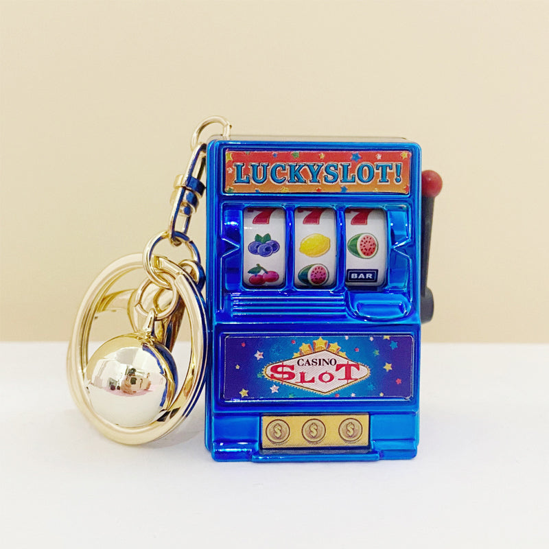 Key ring designed in the form of a slot machine