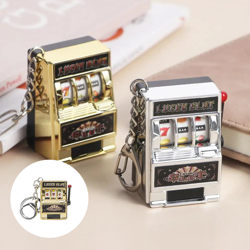 Key ring designed in the form of a slot machine