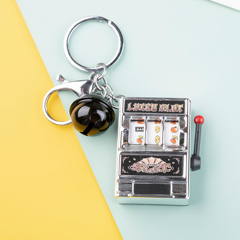 Key ring designed in the form of a slot machine