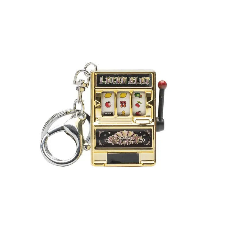 Key ring designed in the form of a slot machine