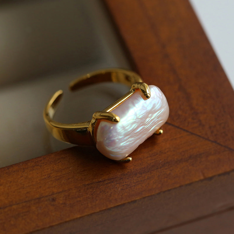 CLAW-SET BAROQUE PEARL RING