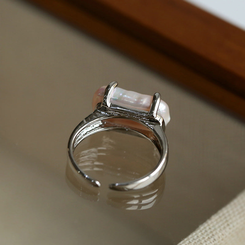 CLAW-SET BAROQUE PEARL RING