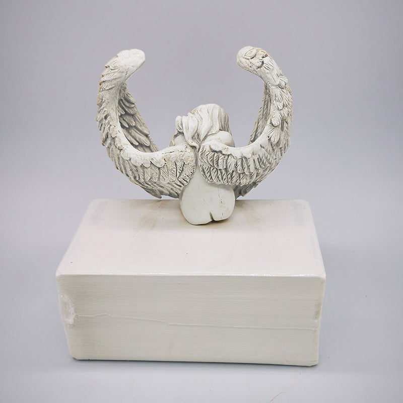 Leg Holding Angel Ornament