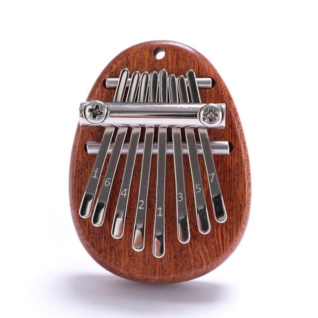 Mini thumb piano