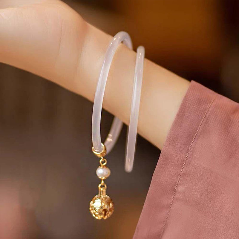 Ancient style bell and jade bracelet