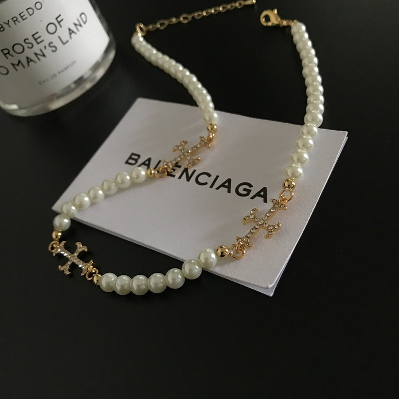 THE DIMIDIUM PEARLY CHAIN CHOKER