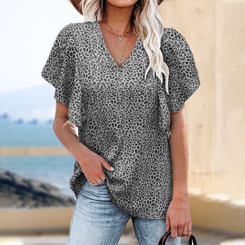 Short-sleeved blouse with V-neck and flower print