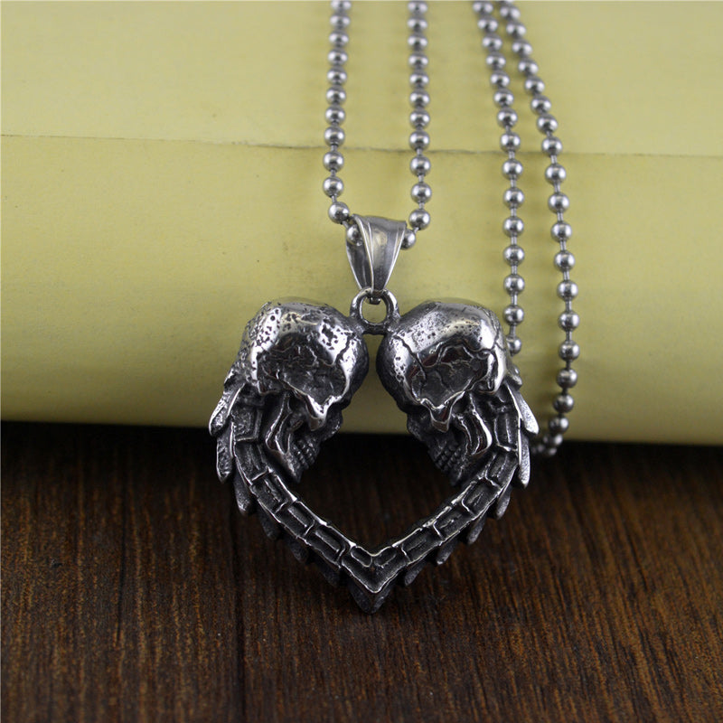Double Skull Heart Necklace