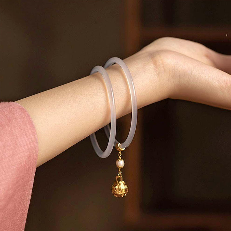 Ancient style bell and jade bracelet