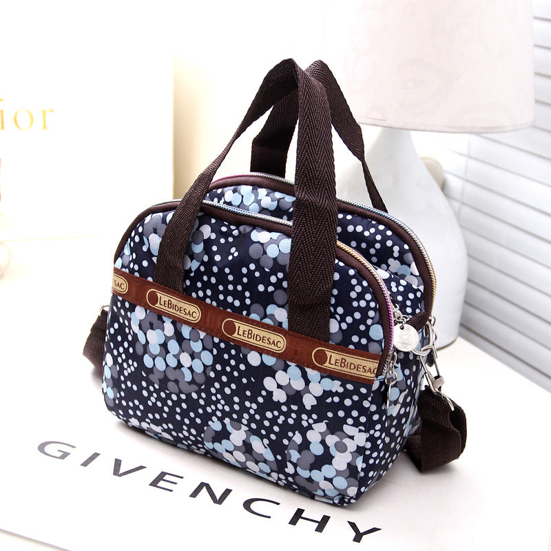 NYLON SHOULDER BAG WITH FLORAL PRINT