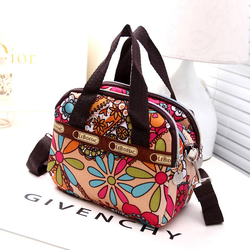 NYLON SHOULDER BAG WITH FLORAL PRINT